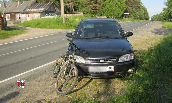 Пряжинский район, 9 июня 2019 года, 18-05.  ДТП с участием велосипедиста и легкового автомобиля КИА (KIA Spectra) произошло на 88-м километре автодороги "Петрозаводск - Суоярви", в деревне Метчелица.